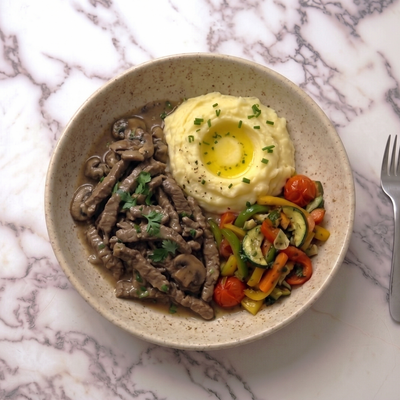 Lomo de res  en salsa de champiñones